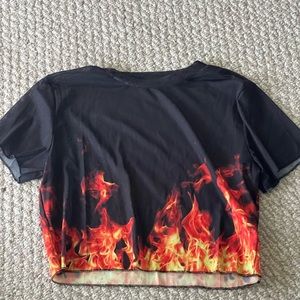 Small goes over shirt